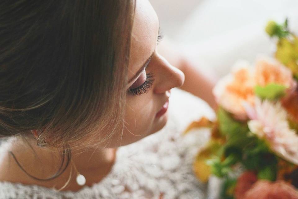 Lace straps against floral arrangement