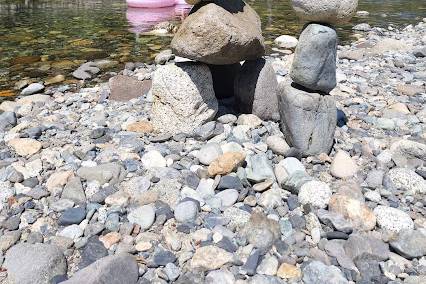 Stone sculpture by river