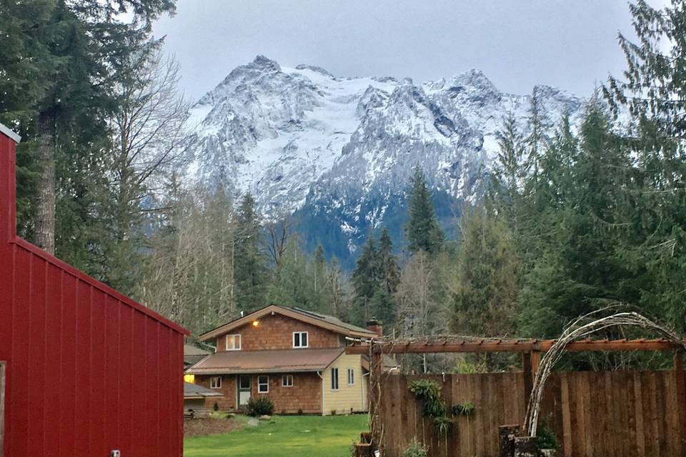 House with mountain backdrop