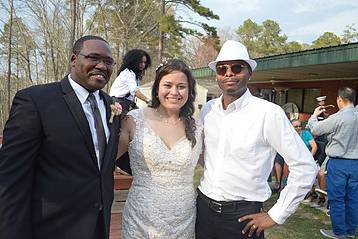 Newlyweds with the DJ