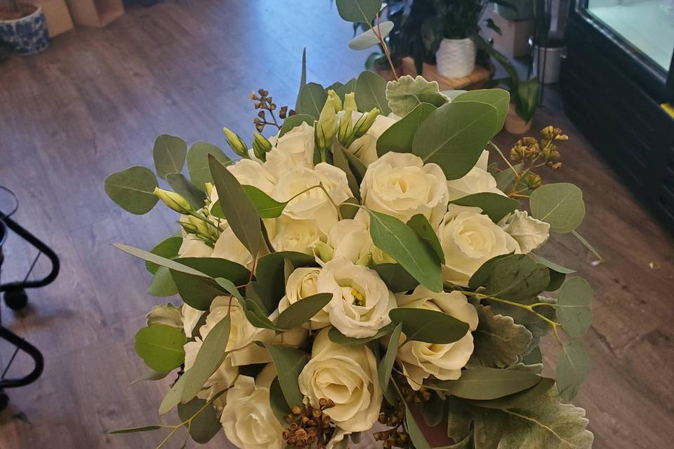 White roses with greenery