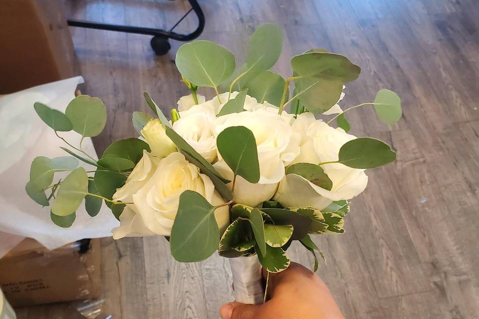 White roses with greenery