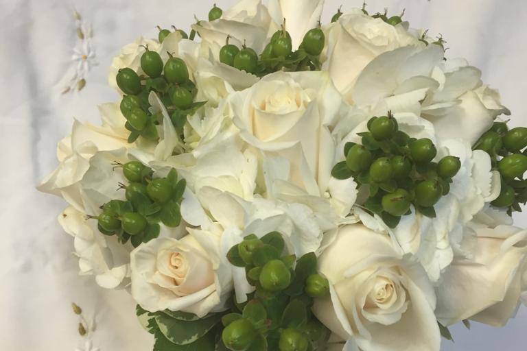 White roses with greens