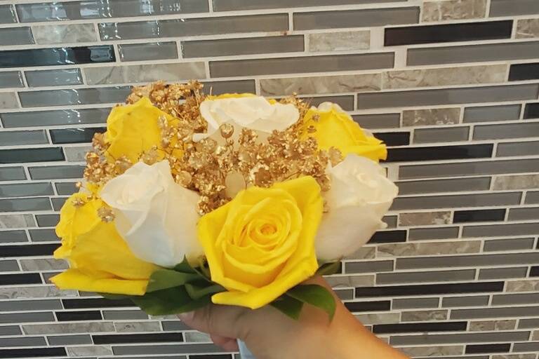 Yellow roses and gold filler