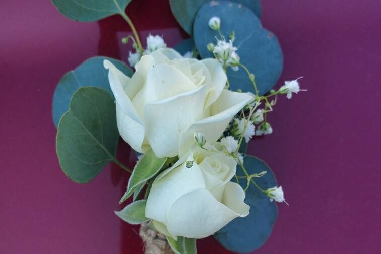 Double white rose with greens