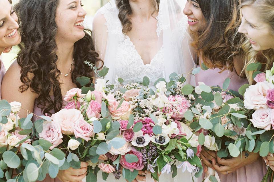 Bridal party and lush bouquets