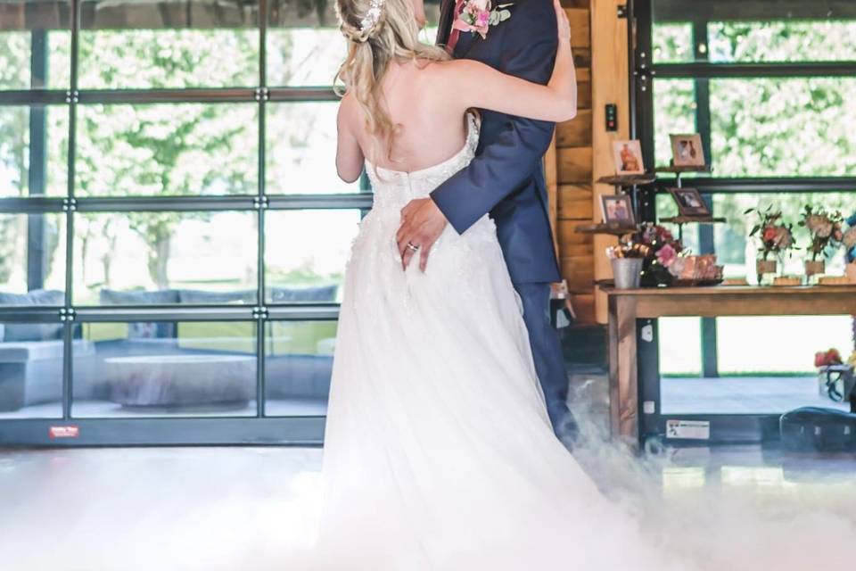 Bride and groom glass doors