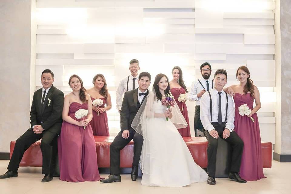 The couple with the bridesmaids and groomsmen