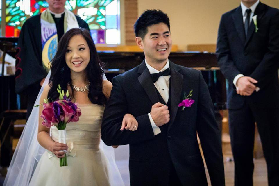 The couple with the bridesmaids and groomsmen