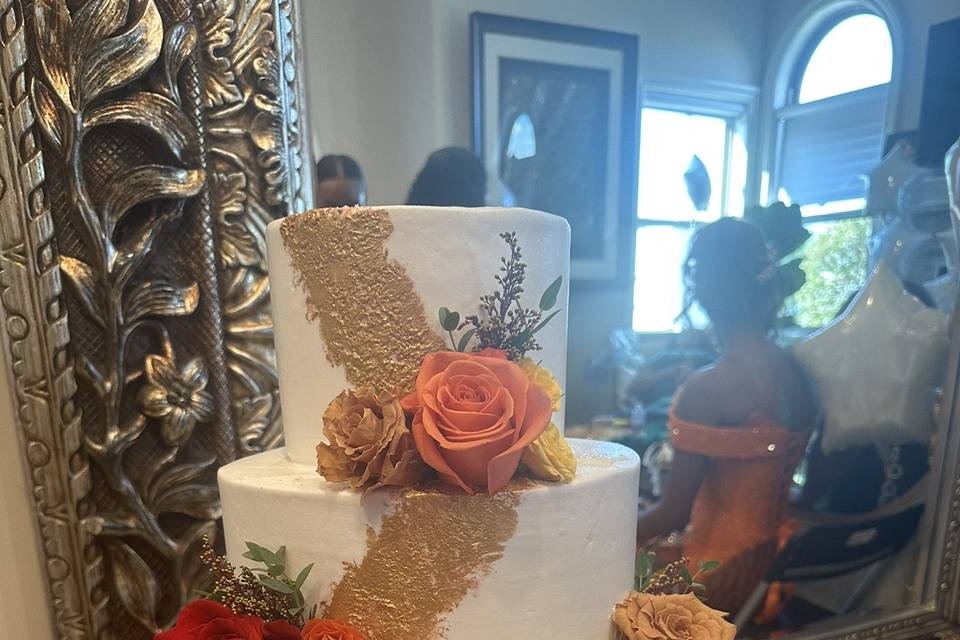 3 tier gold brush cake