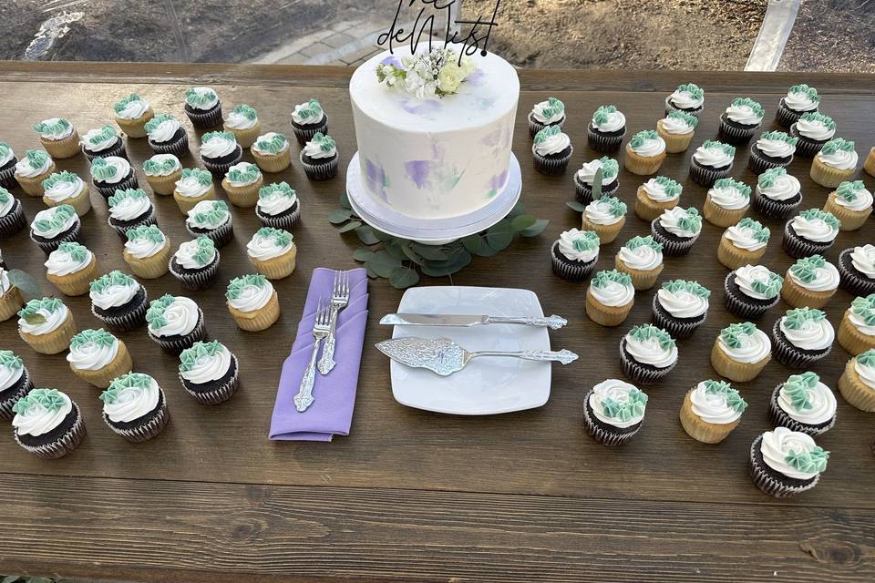 Couple's cake and cupcakes