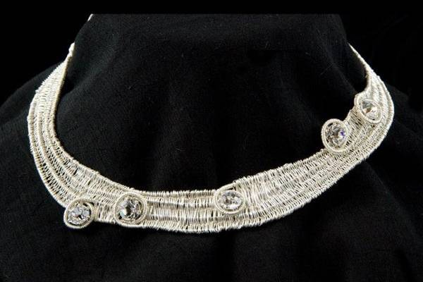 Woven choker in fine silver and sterling silver accented with faceted cubic zirconia.