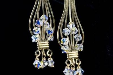 Gold-filled chandelier earrings with Swarovski crystals.  This style is available in a variety of crystal colors and in gold-fill and sterling silver.