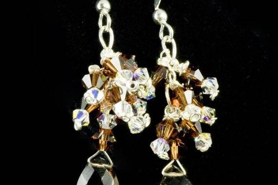 Smokey quartz pears dangle beneath a cluster of Swarovski crystal in these delicate earrings.  This style is availble in several different gemstone and crystal combinations.