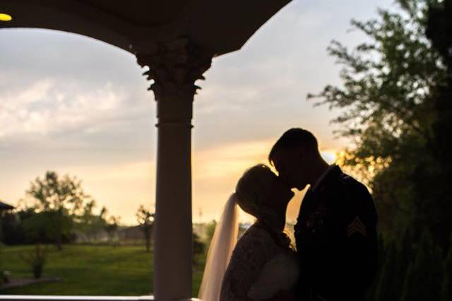 Couple sunset kiss