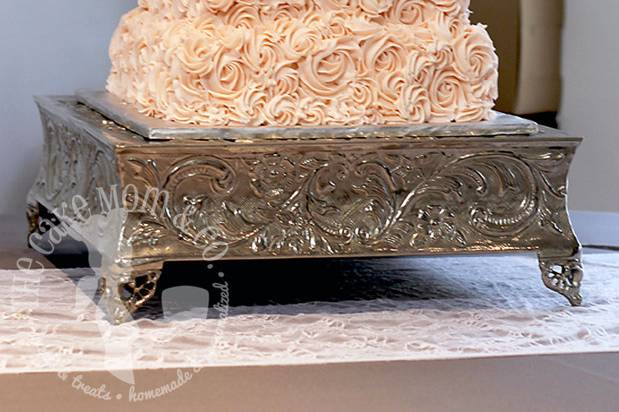 Pearls and rosettes wedding cake