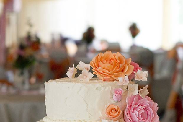 Bright and rustic floral cascade wedding cake