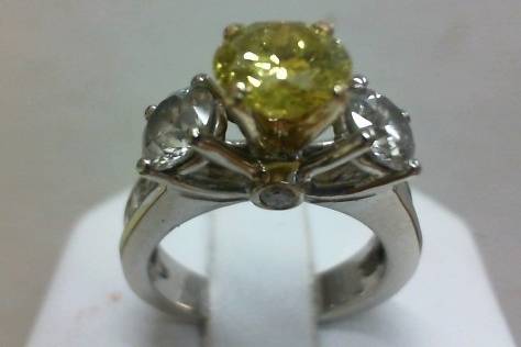 Round canary diamond with round side diamonds