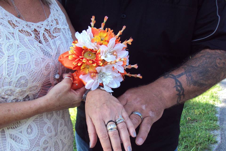 Rings and orange and white flowers