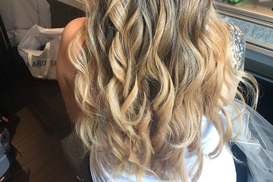 Loose beach waves with braids