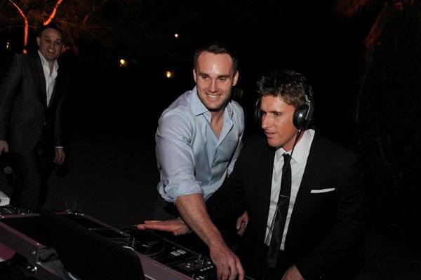 Showing the groom how to work the decks!