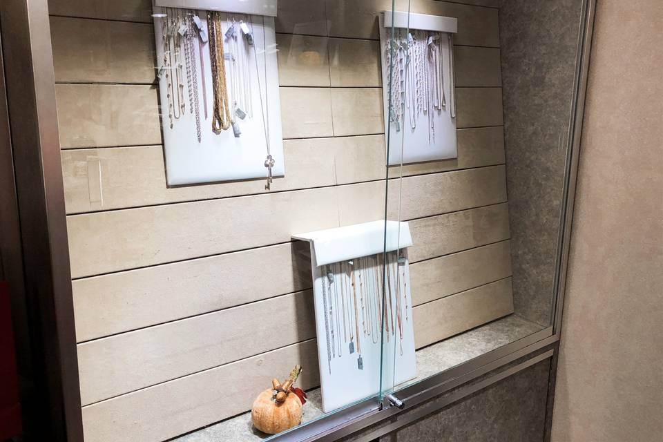 Hanging jewelry on display