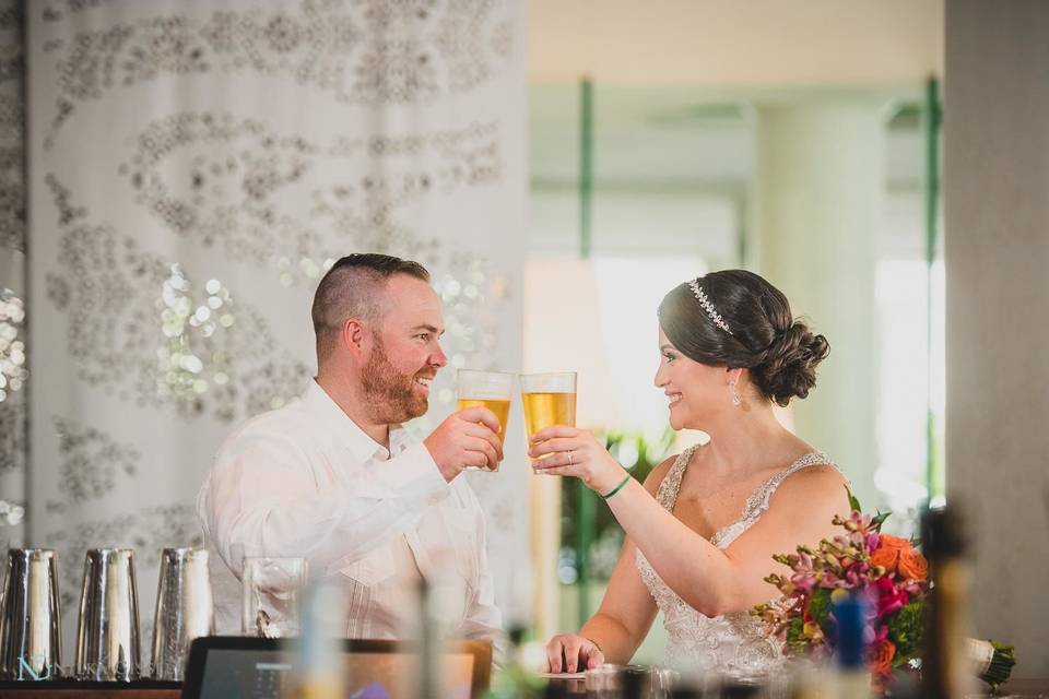 Newlyweds toasting to love