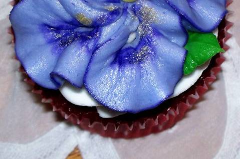 Buttercream Hibiscus Flower piped on a Red Velvet Cupcake!