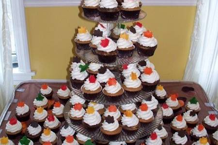 Fall Cupcake Wedding!  Handmade fondant fall leaves in bright fall colors atop marble cupcakes filled with Nutella Mousse filling, and spice cupcakes filled with pumpkin mousse filling