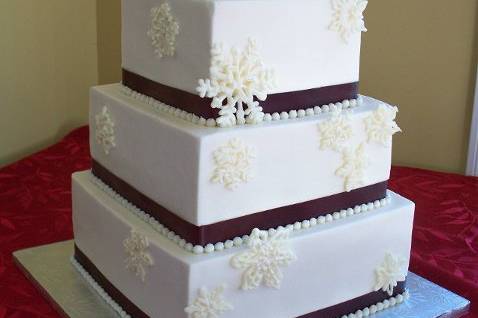 Winter Wedding!  Buttercream with hand-piped white chocolate snowflakes!