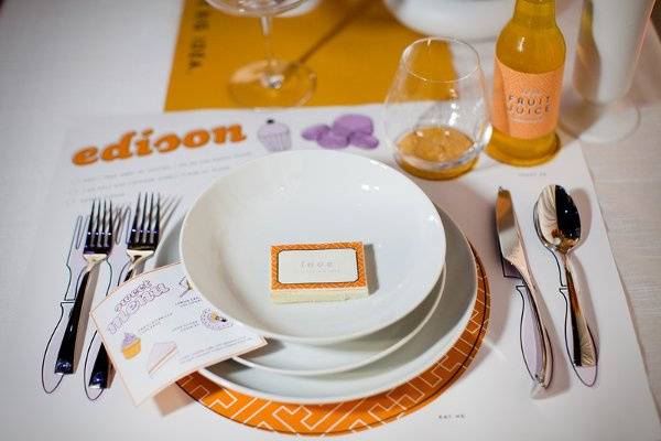 Personalized place mats with interactive elements, menu that can be folded into an origami heart and a custom cookie.