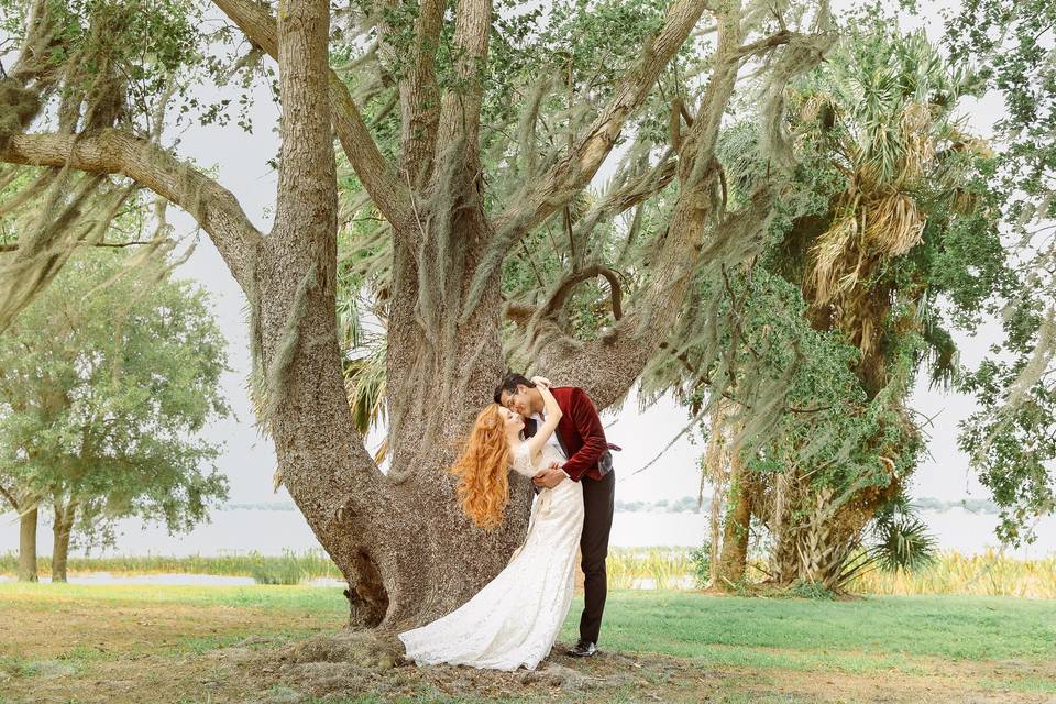 Kissing by a tree