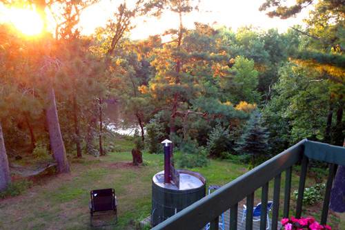 Sunset view from Deck overlooking river.