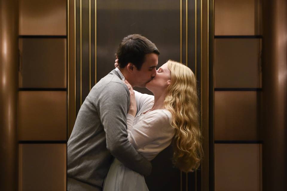 Elevator kiss engagement