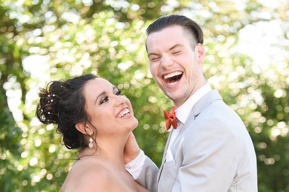 Bride and groom playful