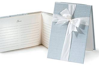 Duponi silk bound guest books with white ribbon on cover... or without ribbon. Lined or unlined pages.