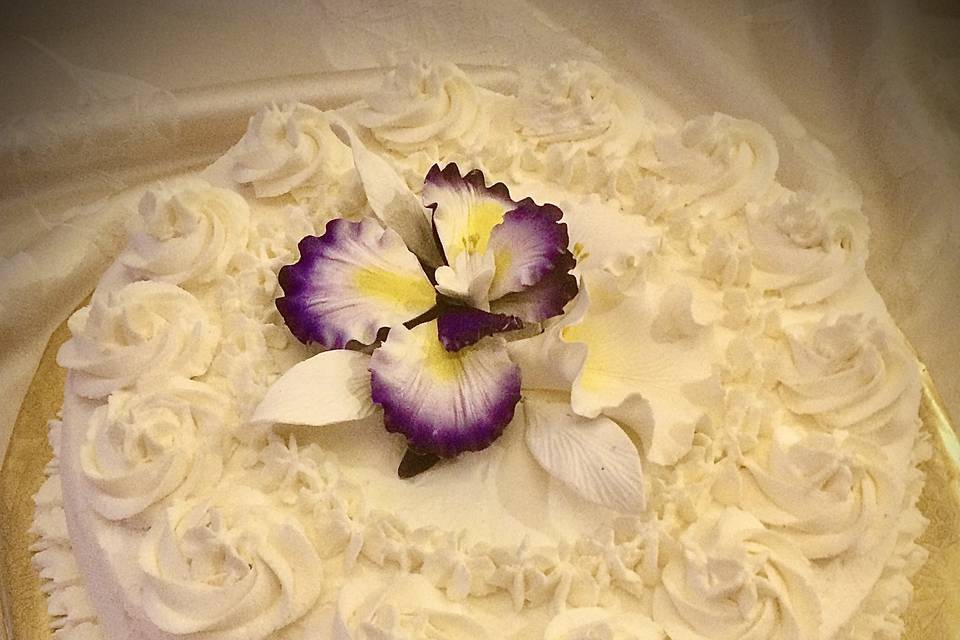 White Cake with Purple Flower