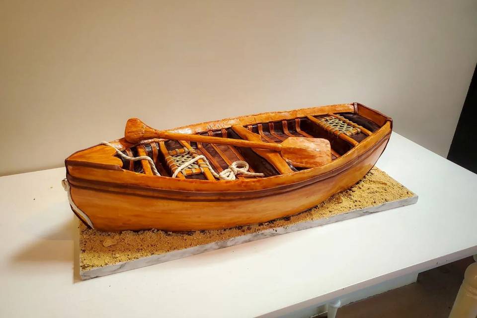 Canoe sculpted cake