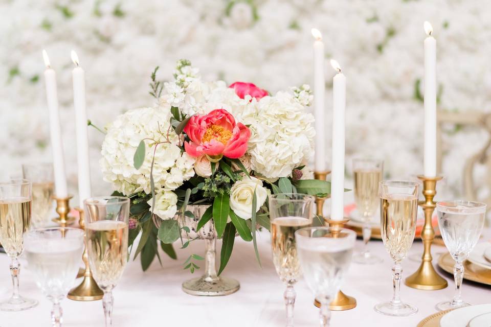 The Flower Wall with centerpieces