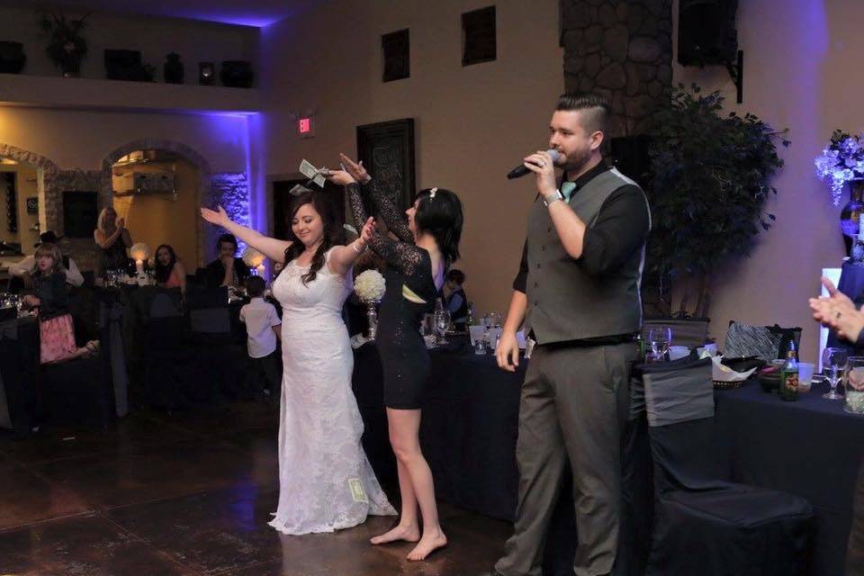 The WINNER of the money dance with the bride's maid makin' it rain! Yes, we turn the money dance into an actual competition, making it much more fun and entertaining for everyone.