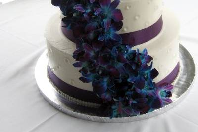Cake with cascading blue flowers