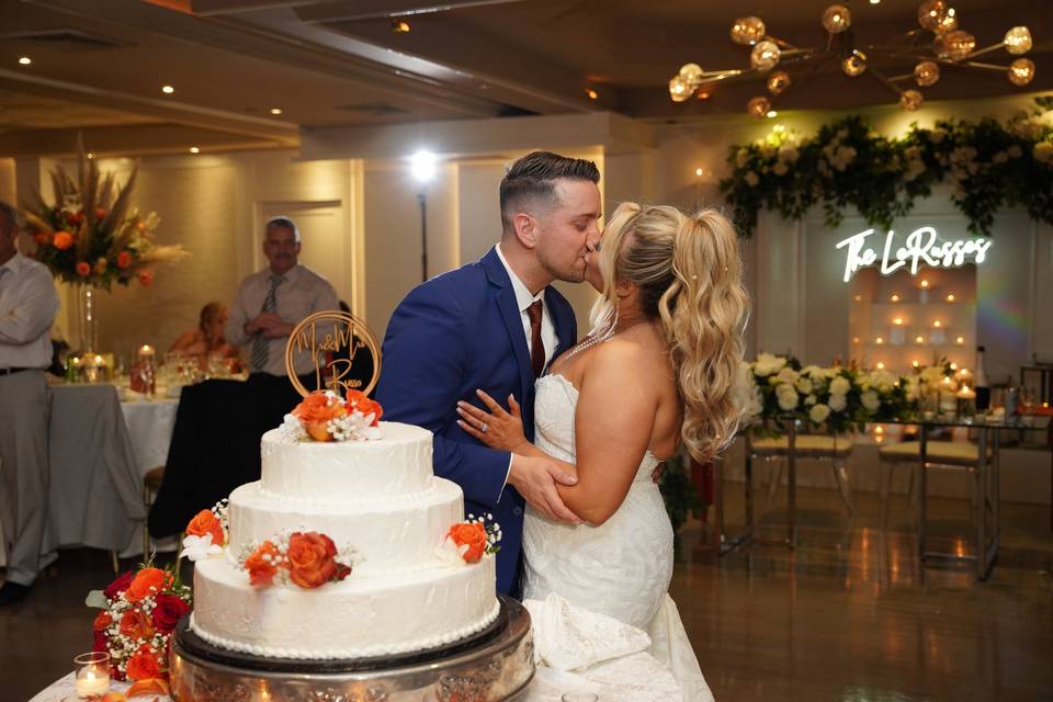 Kiss Behind the Cake