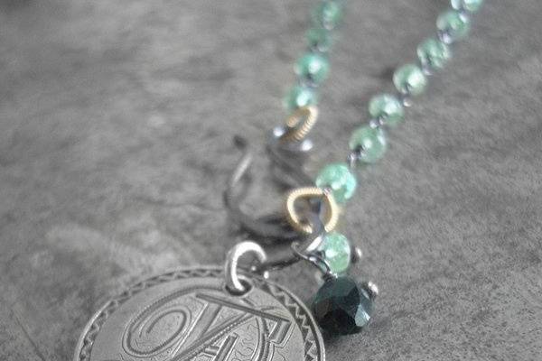 Antique 1874 Love Token engraved with initials DF, on a chain of blackened sterling silver and 18k gold with emerald.