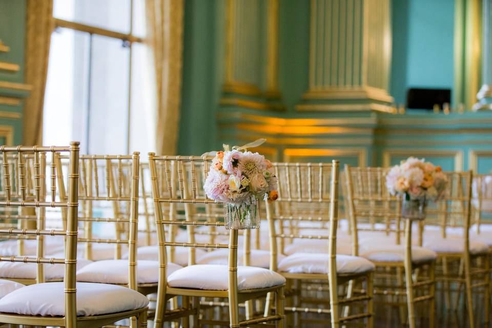 Rustic chair decorated with floral arrangement