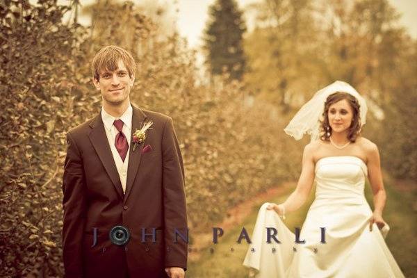 Beautiful environmental portrait of bride and groom on wedding day near Rockford IL.