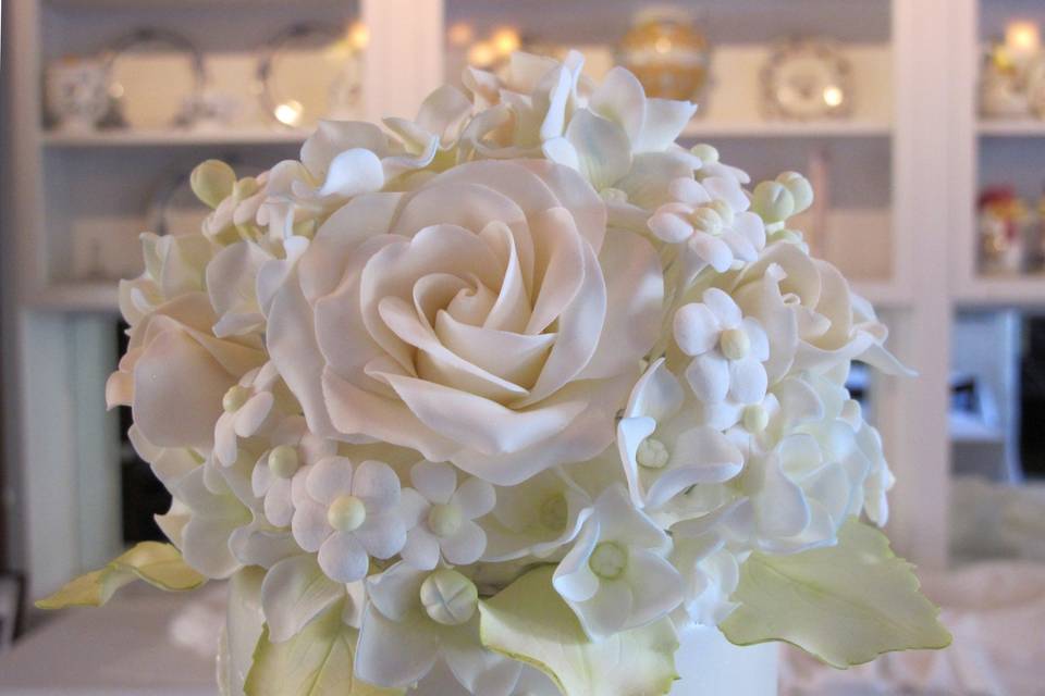 Close up of sugar flower wedding cake topper by Let's Do Cake!