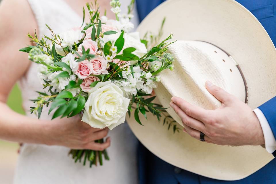 Bouquet and cowboy hat