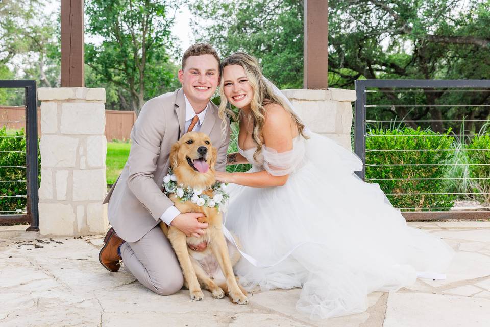 Bride and groom with dog
