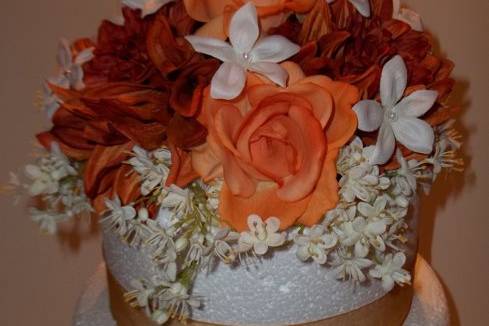 Real Touch Cake Topper. Roses, Dahlias in shades or fall. This topper is sitting on an 8