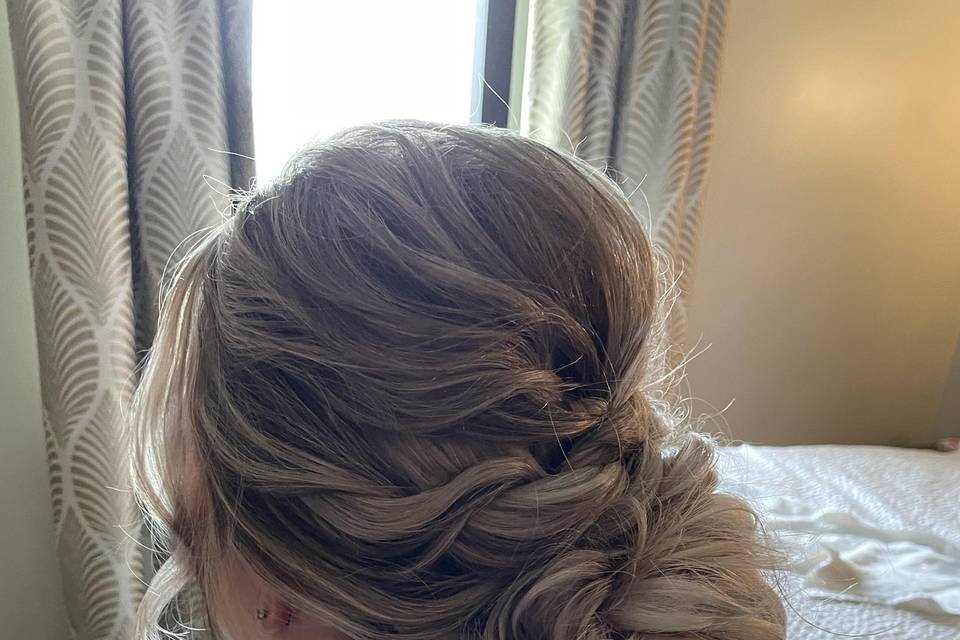 Low bun w/ added clip in hair